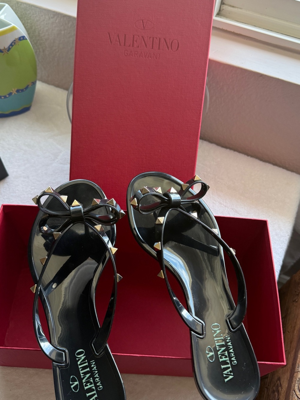 Valentino Garavani Black Jelly Bow Sandal with Gold Studs